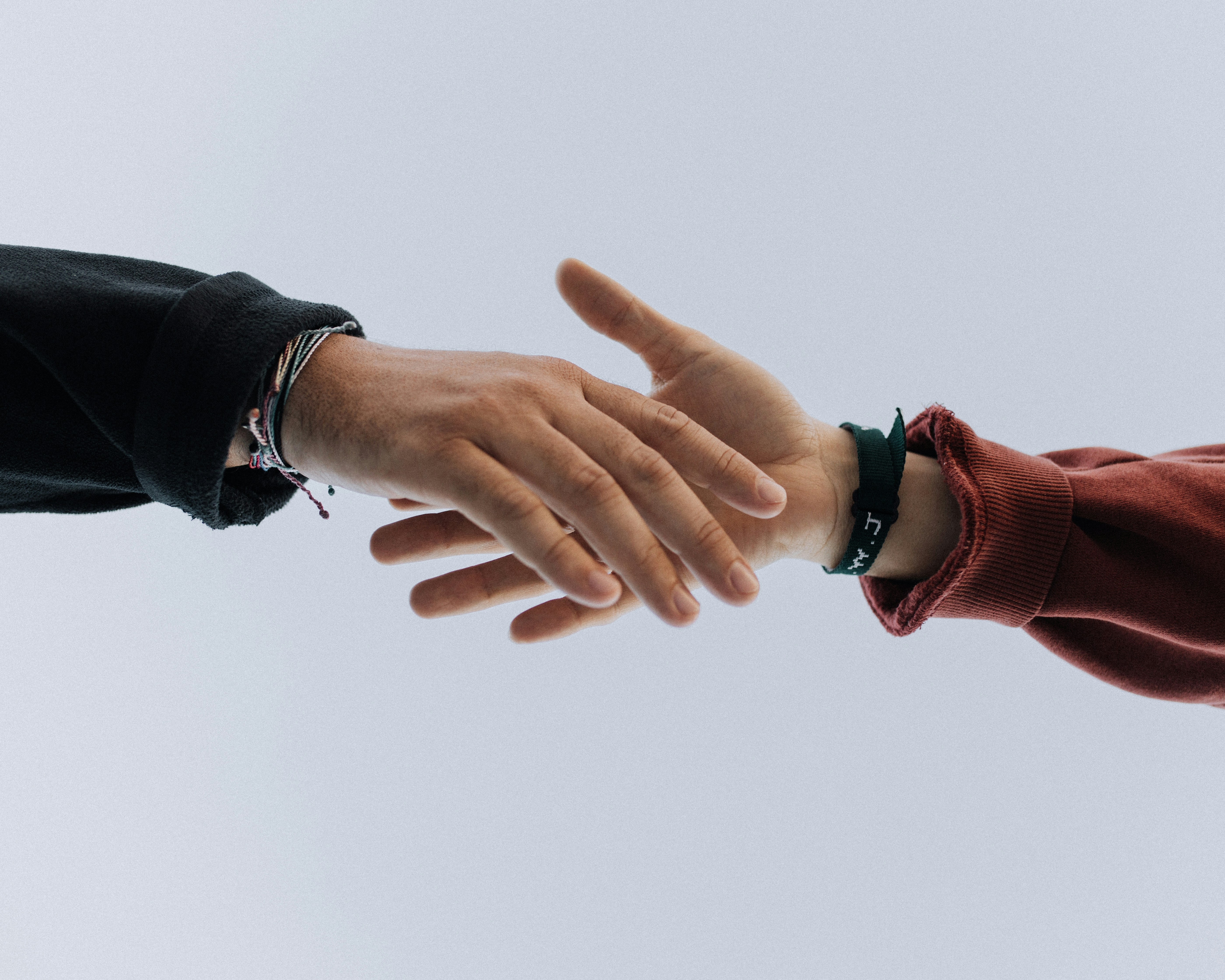 View of two person's hands